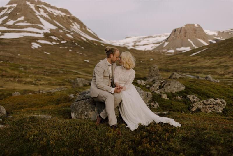 A romantic image of a couple in the mountains in Iceland.