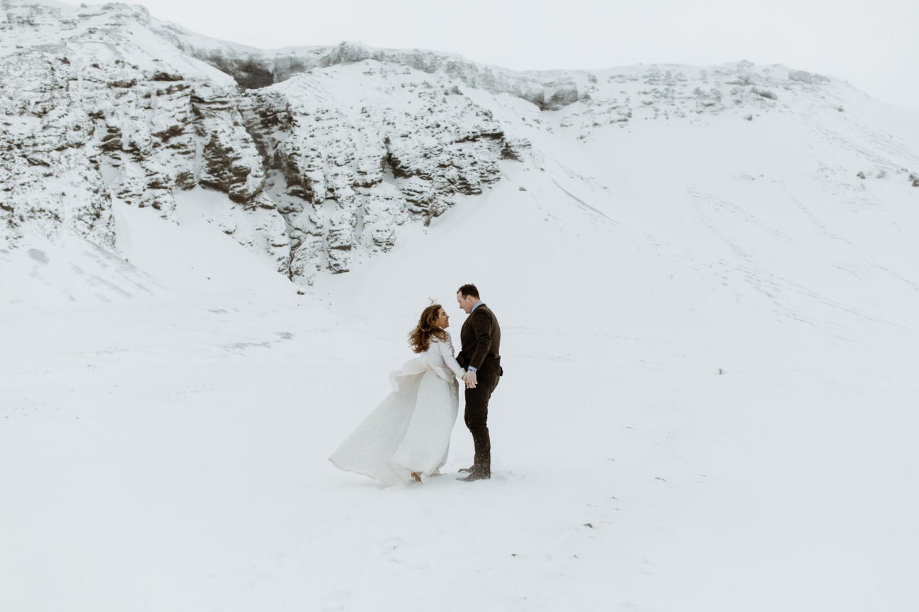 A winter wedding in Iceland with snow covered landscapes.