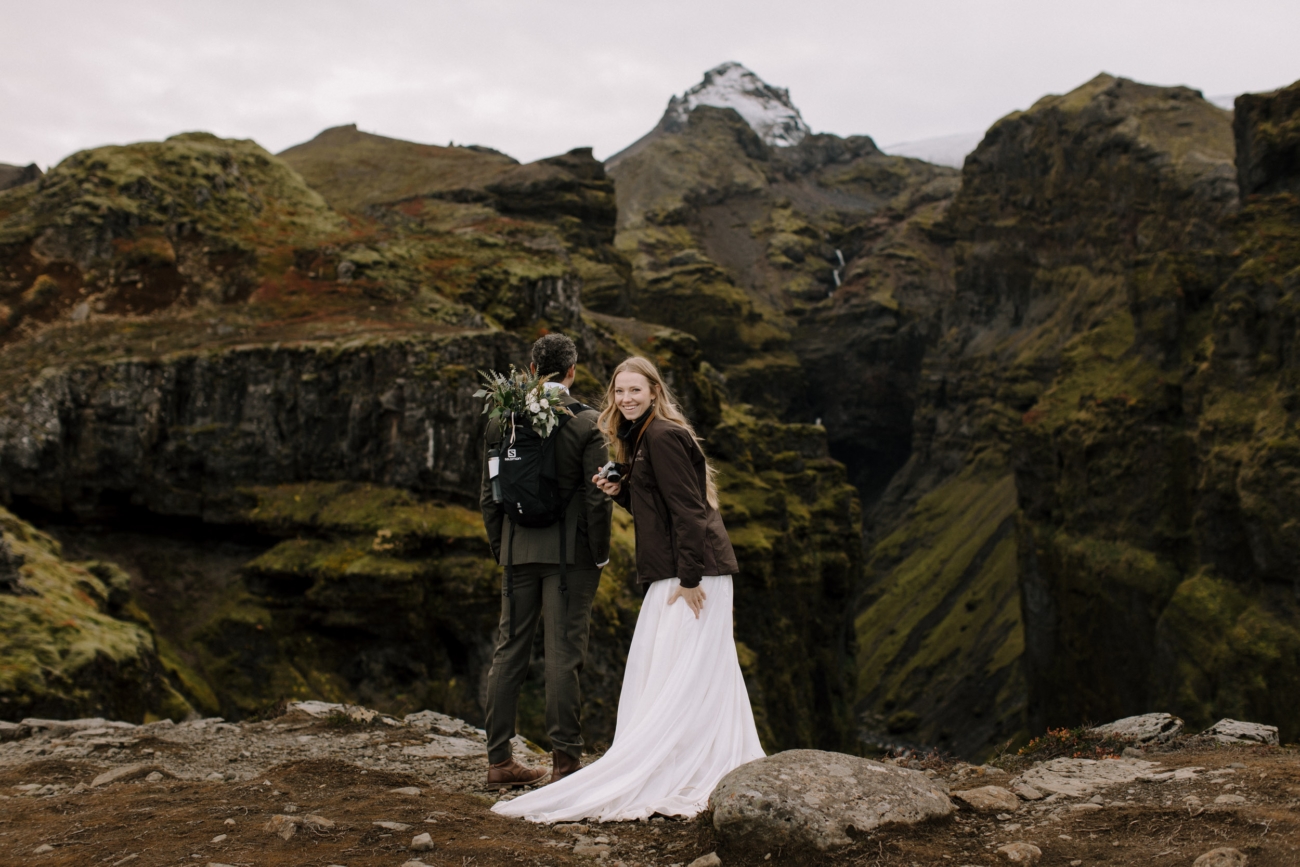 A couple overlooks a magnificent gorge in south east Iceland.