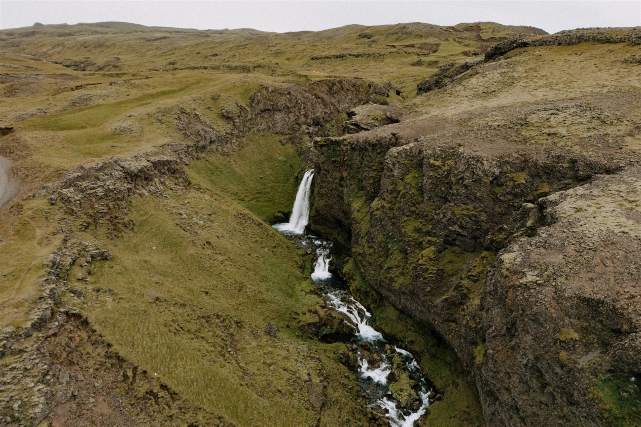 A hidden waterfall in the mountains of south Iceland. The perfect spot for a private elopement ceremony?