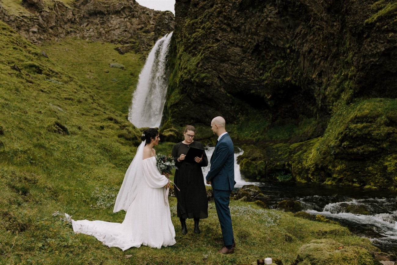 A private elopement ceremony in front of a secret waterfall in Iceland.