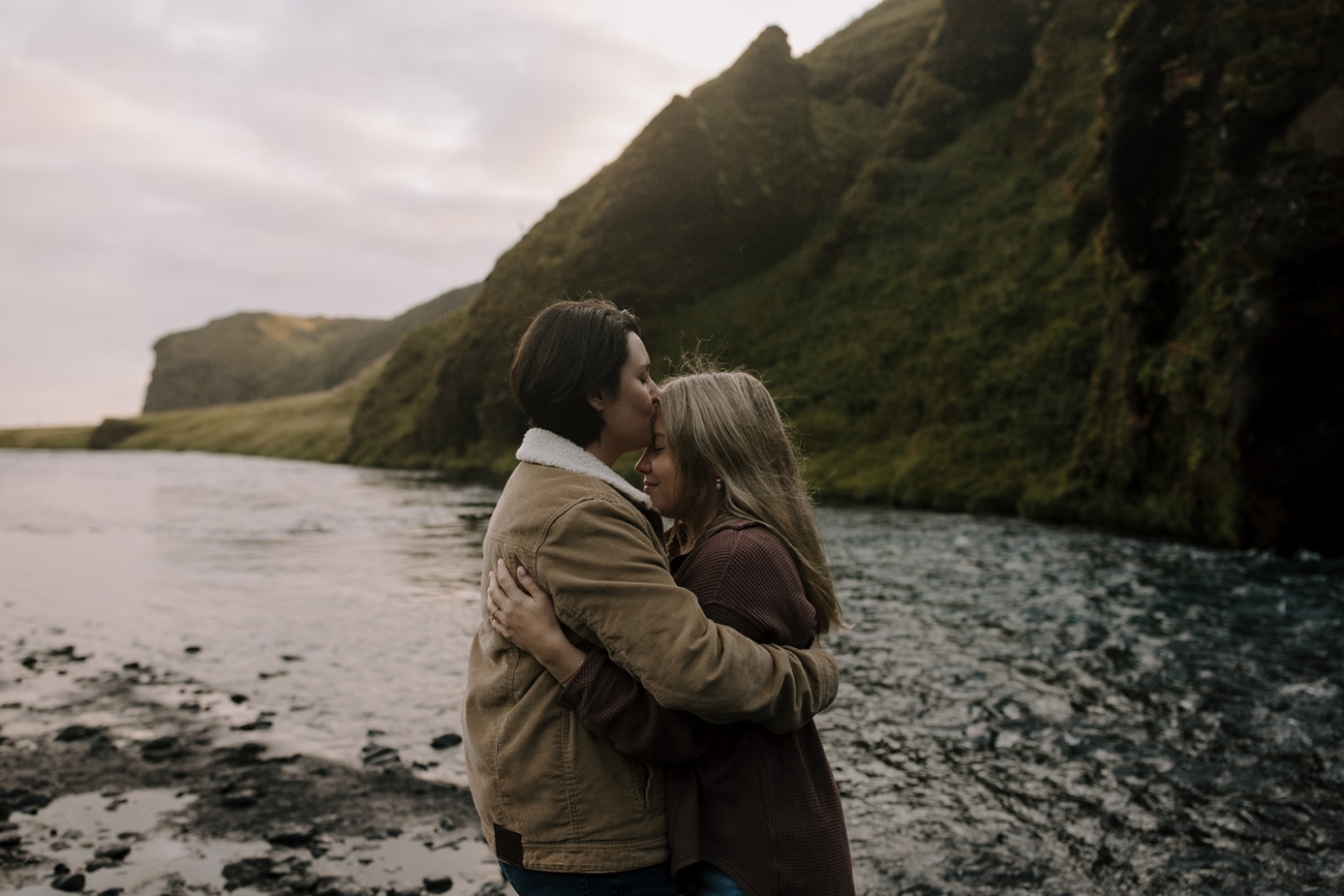 More forehead kisses, this time on the side of a river.