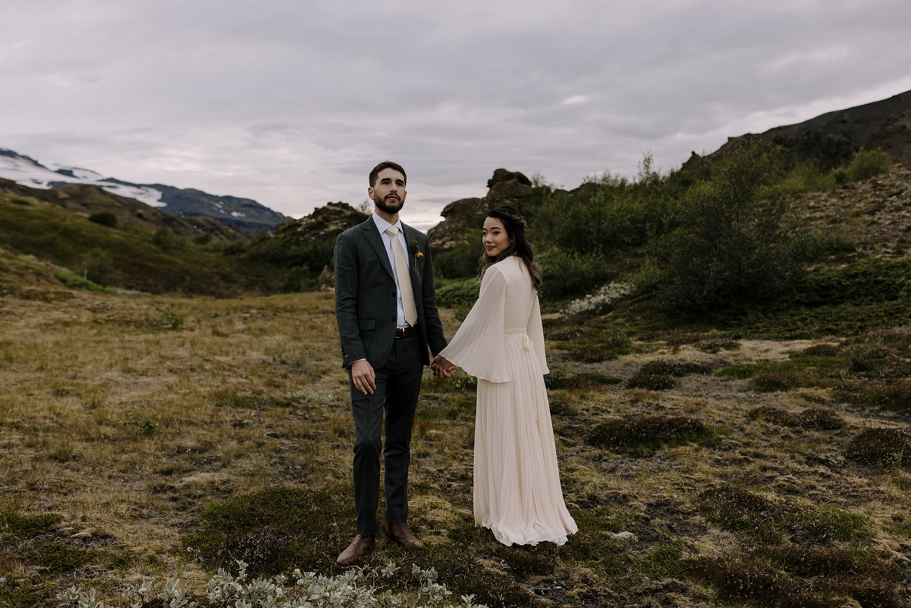 Moss covered landscapes makes a beautiful contrast to wedding outfits. 