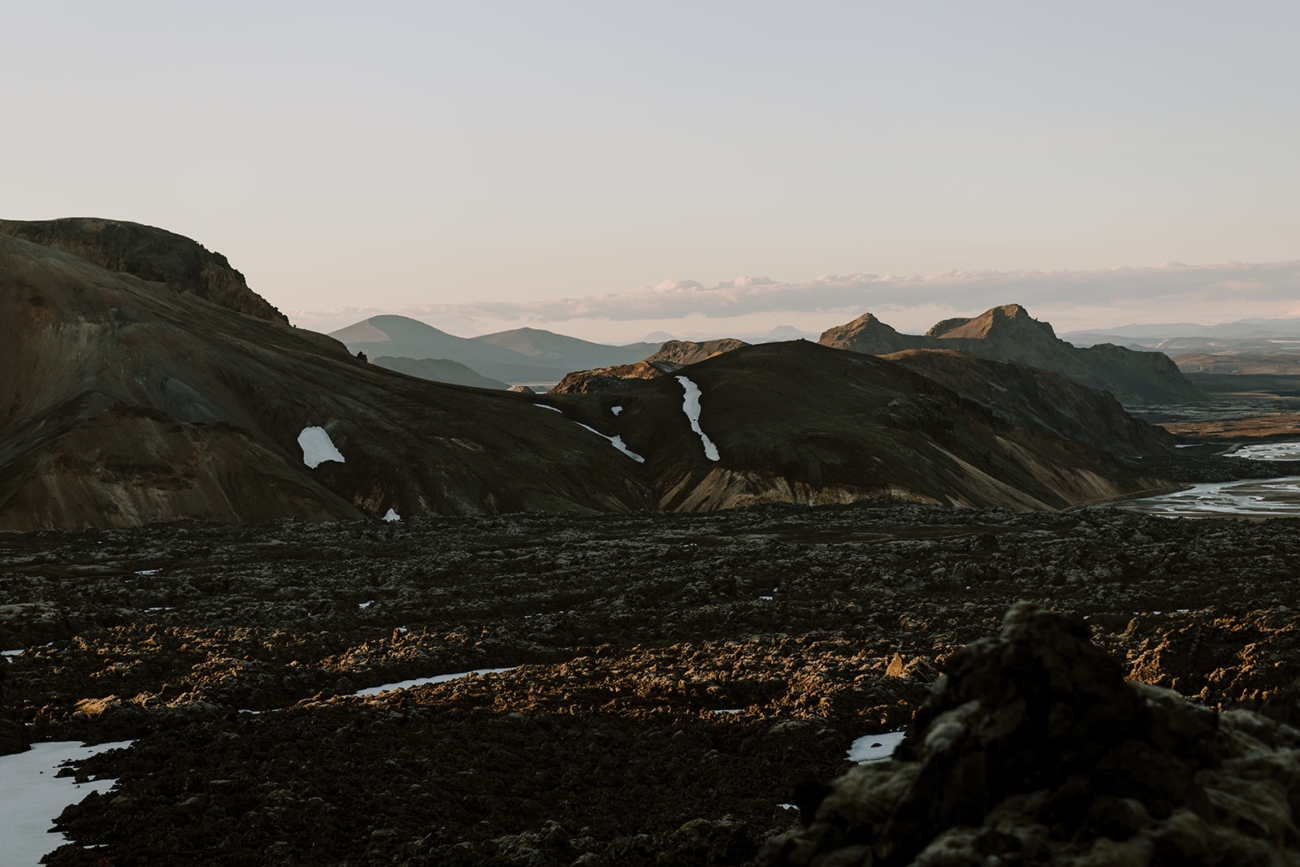 The long shadows of the midnight sun cast over the highland landscapes of Iceland.