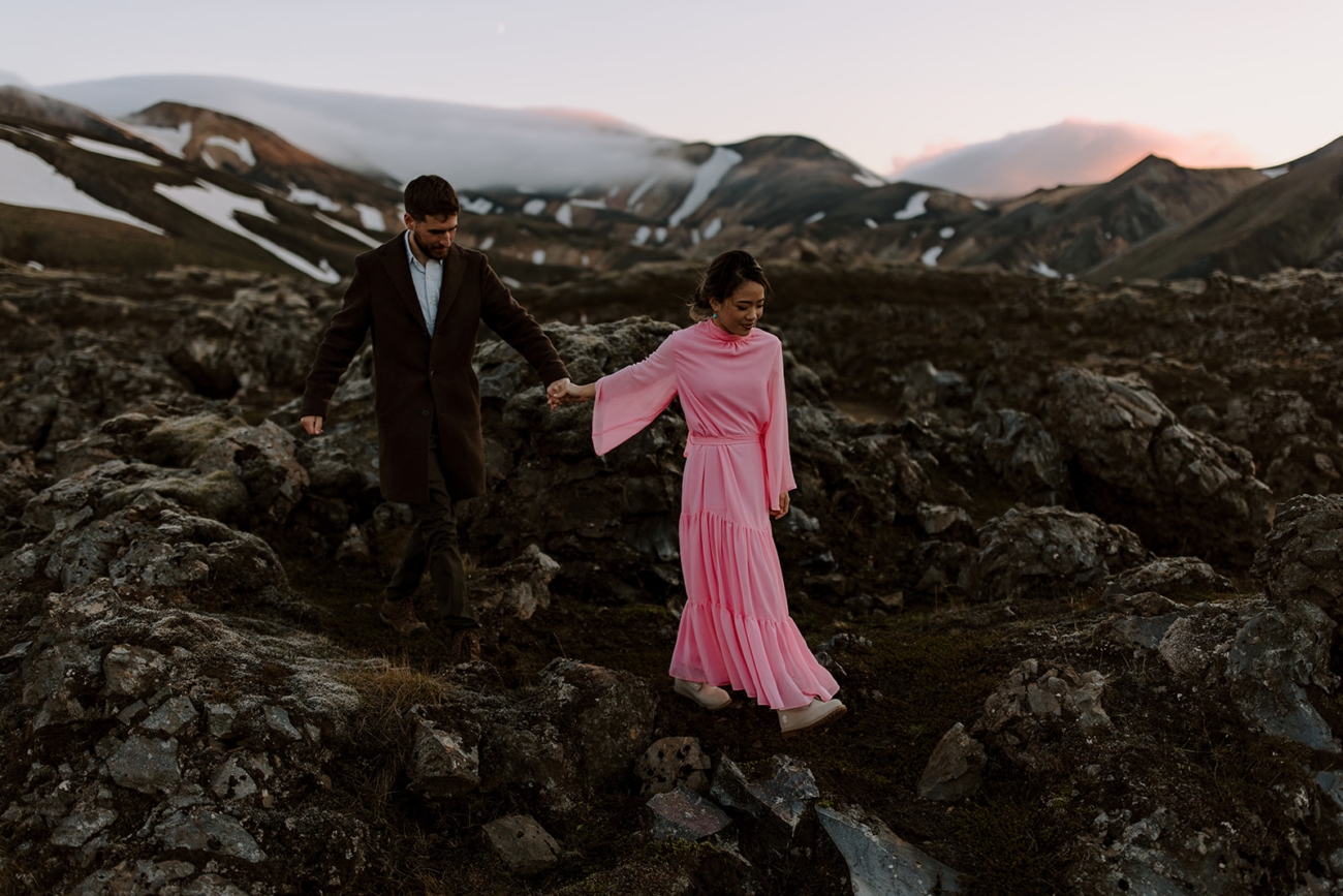Elopement portraits in the midnight sun amongst the mountains and lava fields of Iceland. 