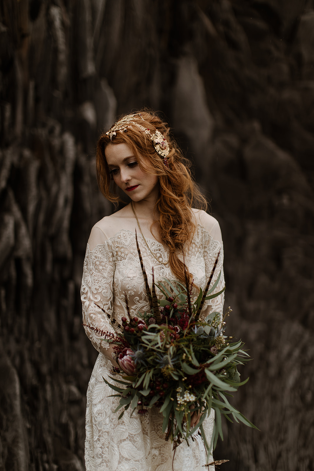 A bride with beautiful art deco detail pieces, elegant dress and a wild flower bouquet.