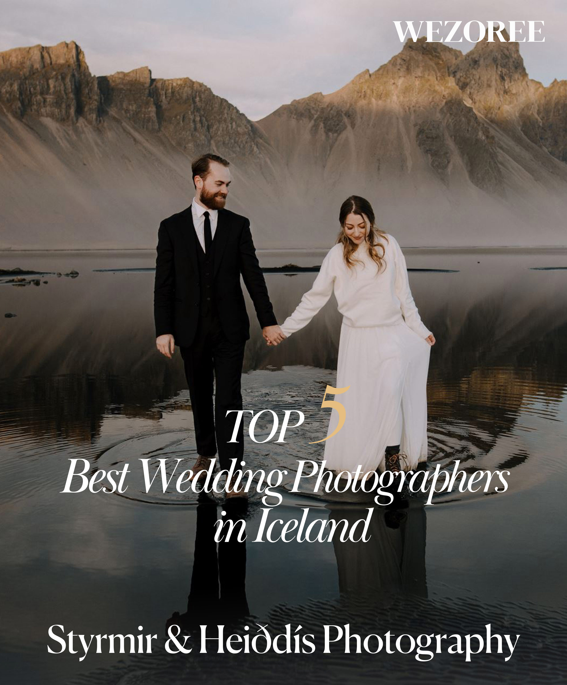 An image of a bride and groom walking across shallow water mirroring their surroundings on their Iceland elopement day. Text overlay says Styrmir & Heiðdís where picked among the top 5 wedding photographers in Iceland by Wezoree.