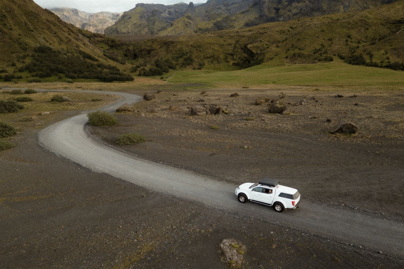 A 4x4 driving into the valley of Þórsmörk in the Icelandic highlands. 